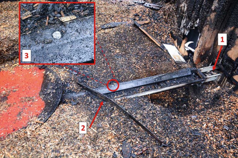 Bild 9 / Übersichtsaufnahme des beräumten Hackschnitzellagers: 1) Außerhalb des Bunkers sind in der Austragung keine verkohlten Hackschnitzel vorhanden. 2) Federblattarm, der über den Boden streift 3) Schraubenkopf mit offensichtlichem Materialabtrag